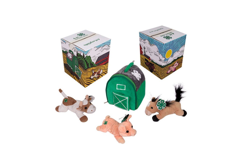 Product Shot of 4H Member Gift, Including a Plush Cow, Horse, Pig, and Barn