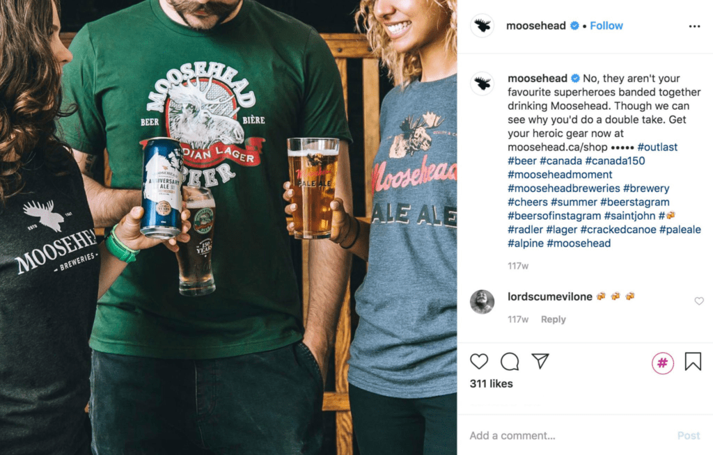 Moosehead sweaters on three people drinking beers